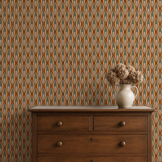 A styled interior scene showing patterned wallpaper in 70s style behind a wooden chest of drawers
