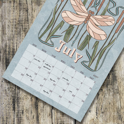 July page of the Art Nouveau Garden Dreams wall calendar with a dragonfly illustration