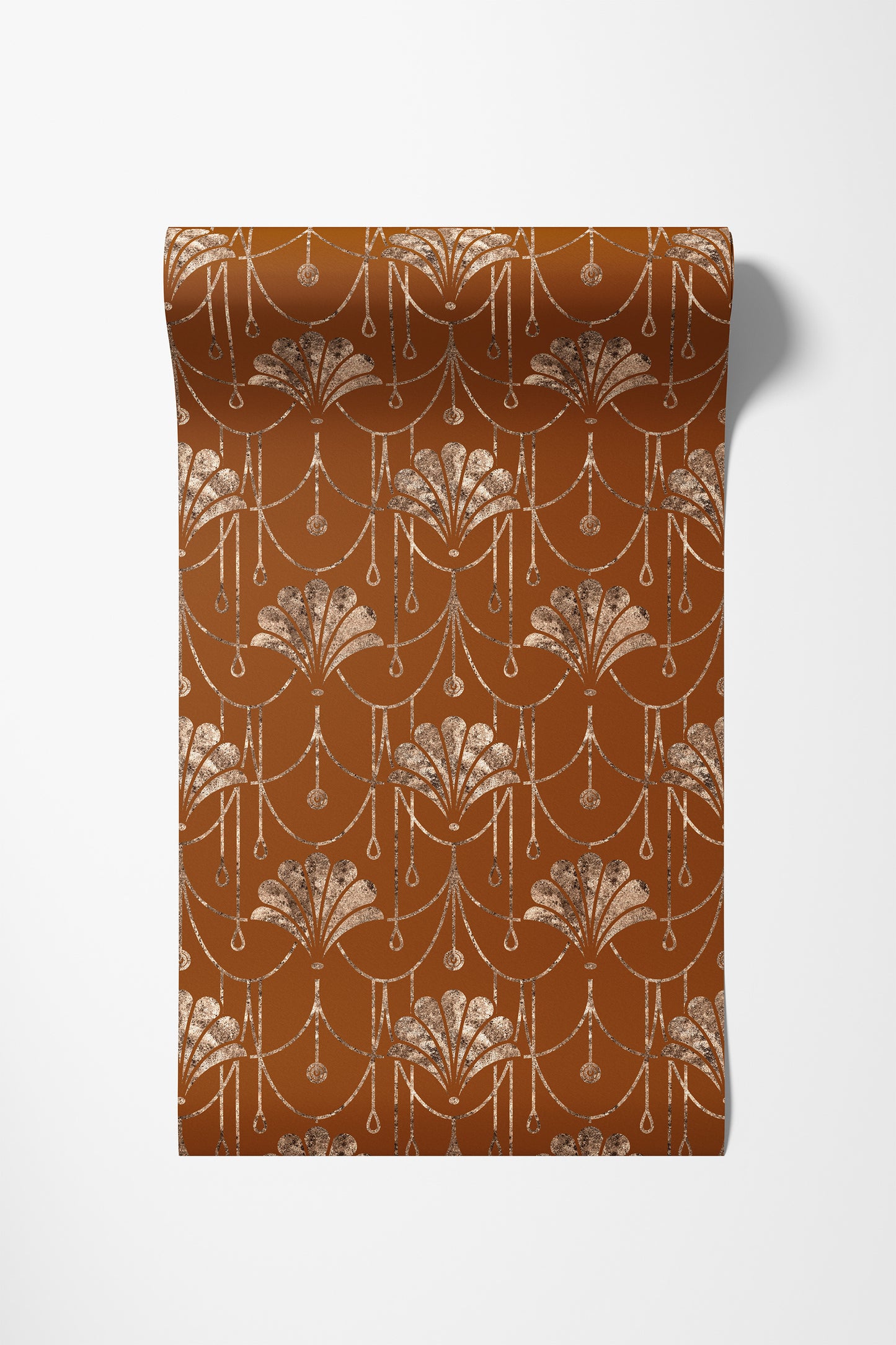 A roll of brown wallpaper with a repeating Art Deco style pattern in metallic gold and beige, shown against a plain white background.
