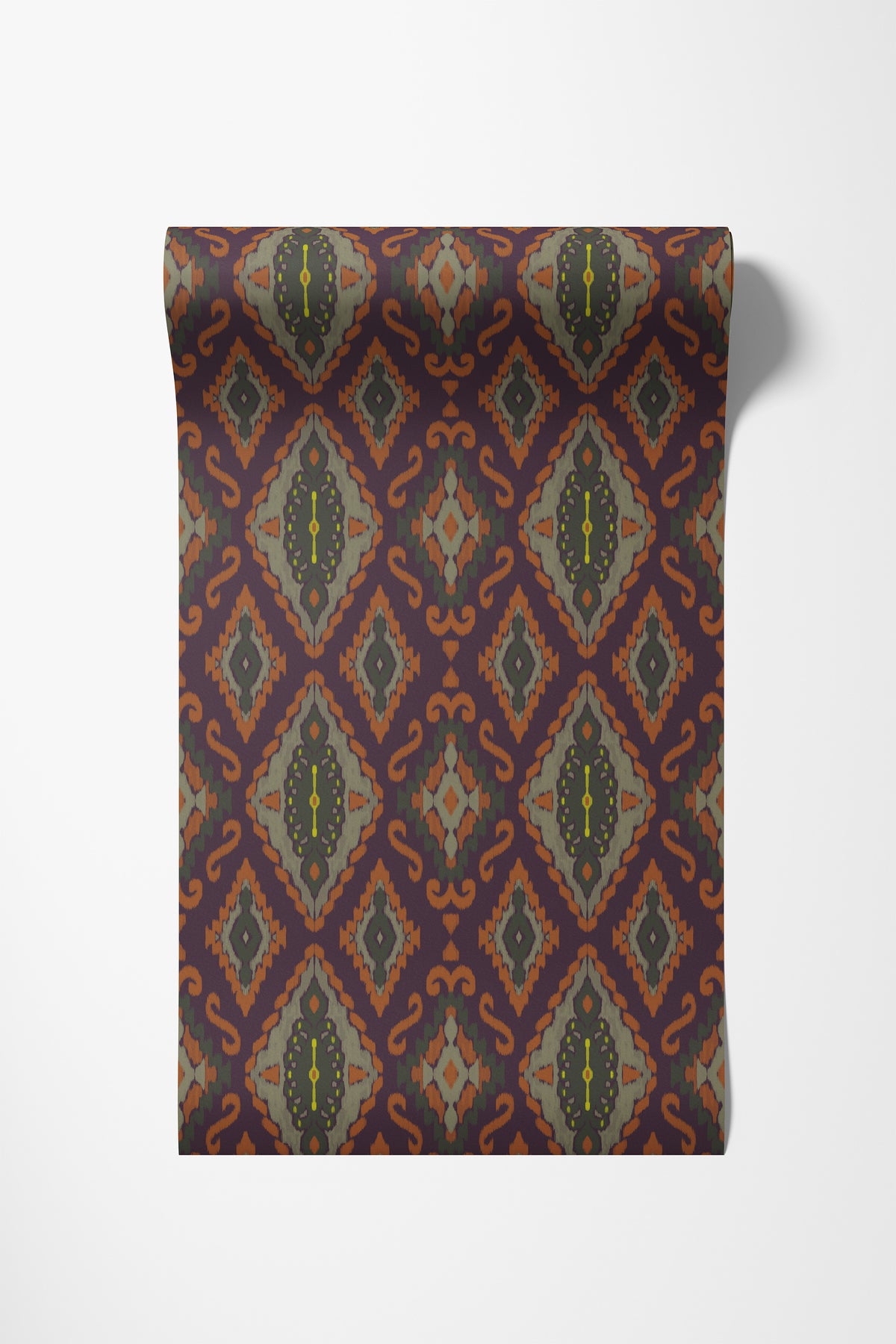 Roll of ikat wallpaper in moody purple