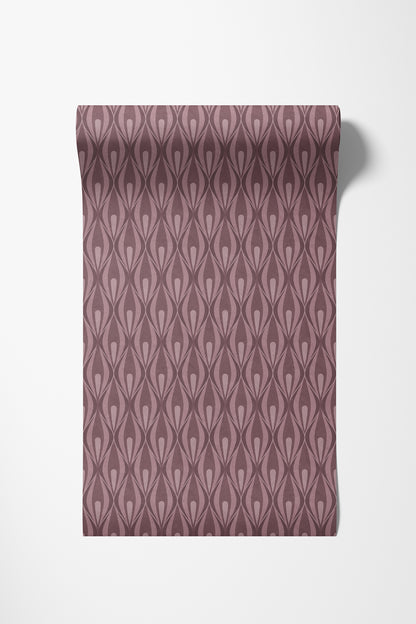 A roll of wallpaper with a dusty rose and mauve ogee pattern, shown partially unrolled against a clean white background.