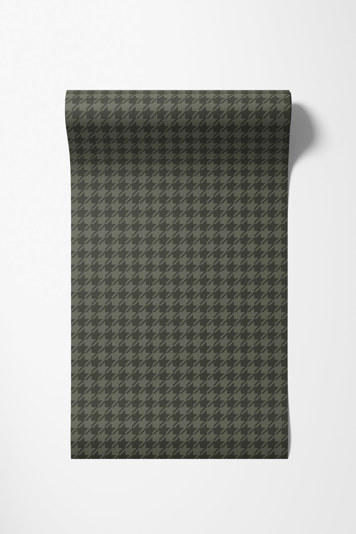 Roll of houndstooth wallpaper in dark sage green