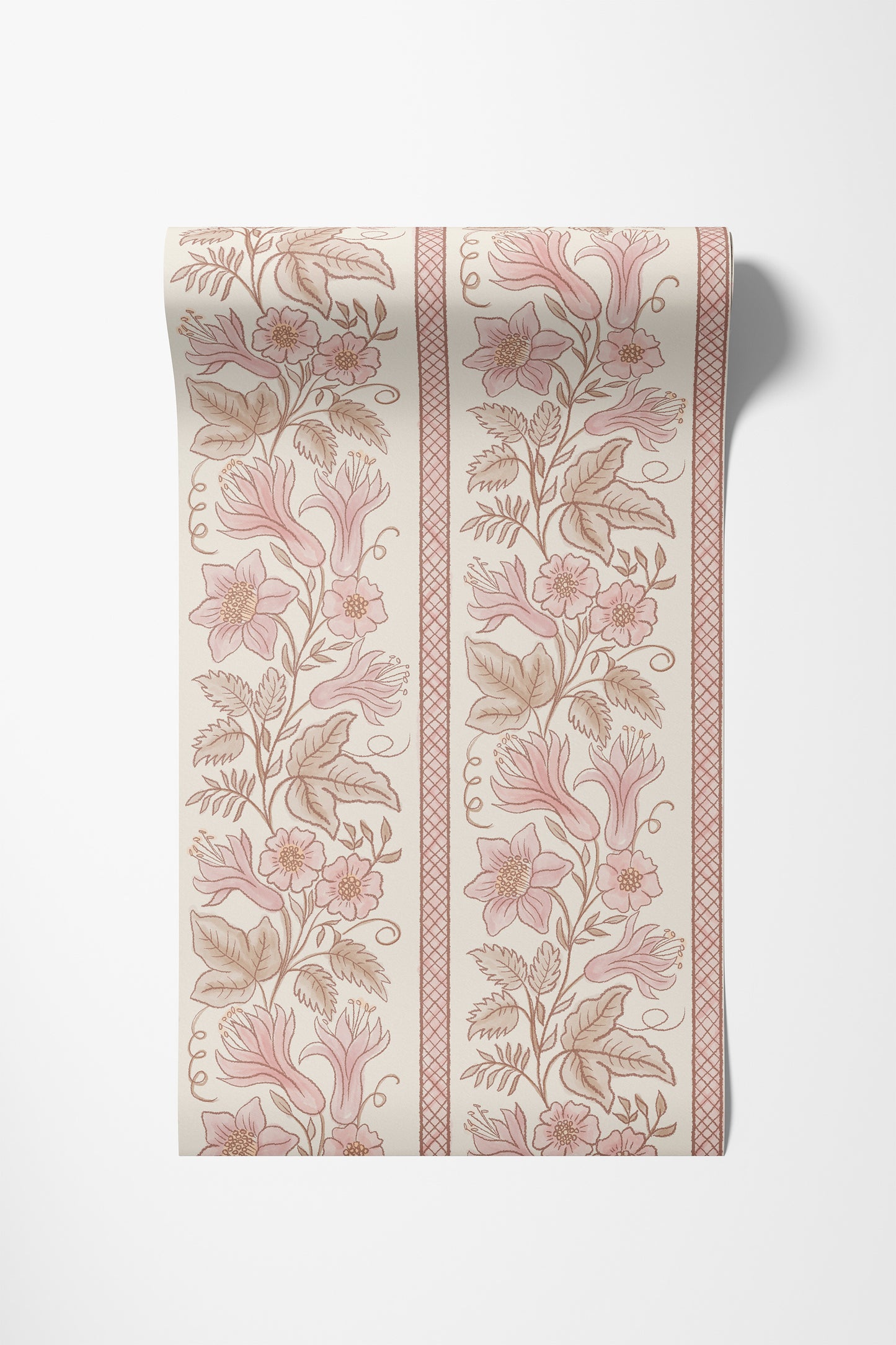 A roll of wallpaper with a girly  vintage botanical pattern featuring pink flowers and brown leaves on an off-white background, shown against a light gray wall.