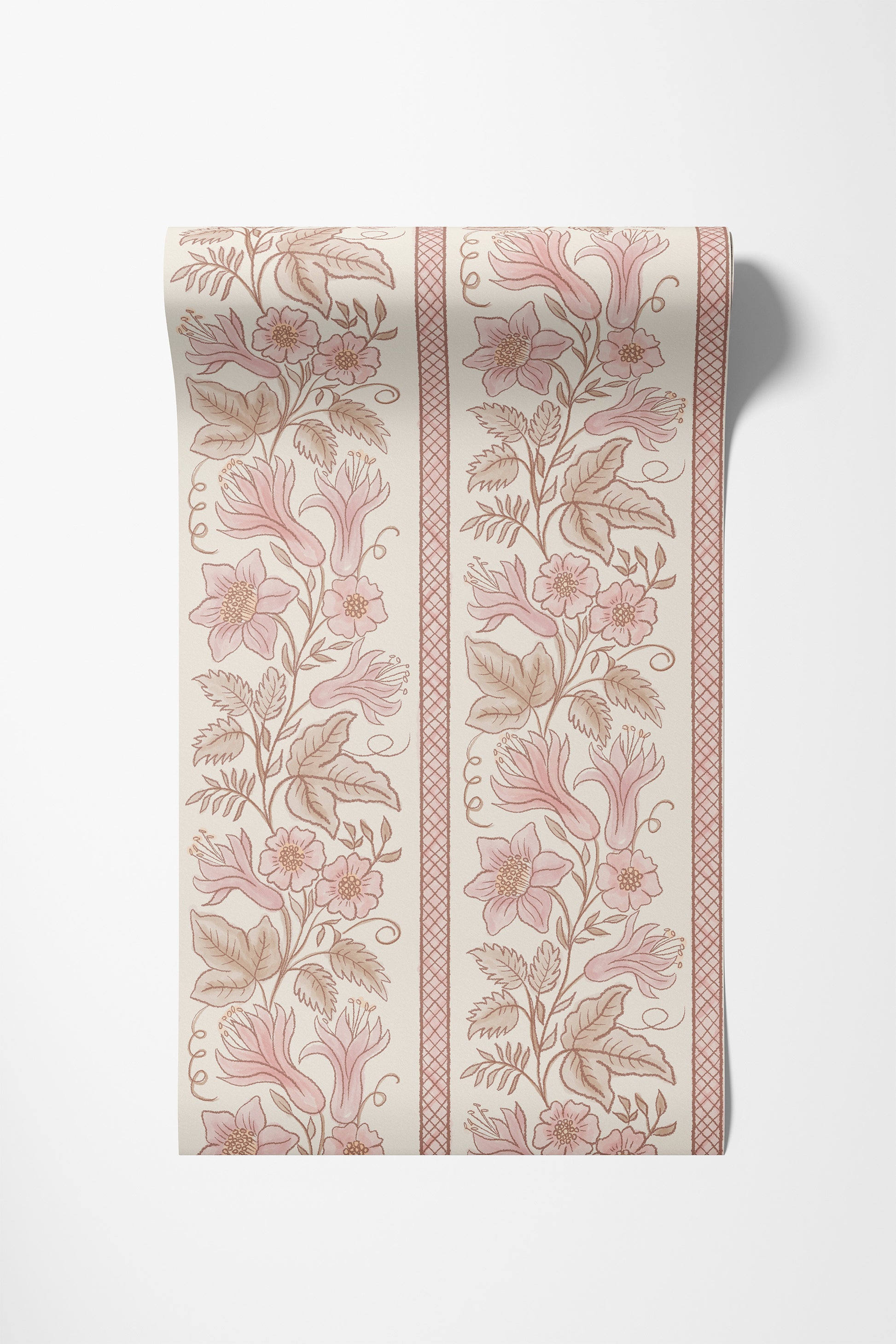 A roll of wallpaper with a girly  vintage botanical pattern featuring pink flowers and brown leaves on an off-white background, shown against a light gray wall.