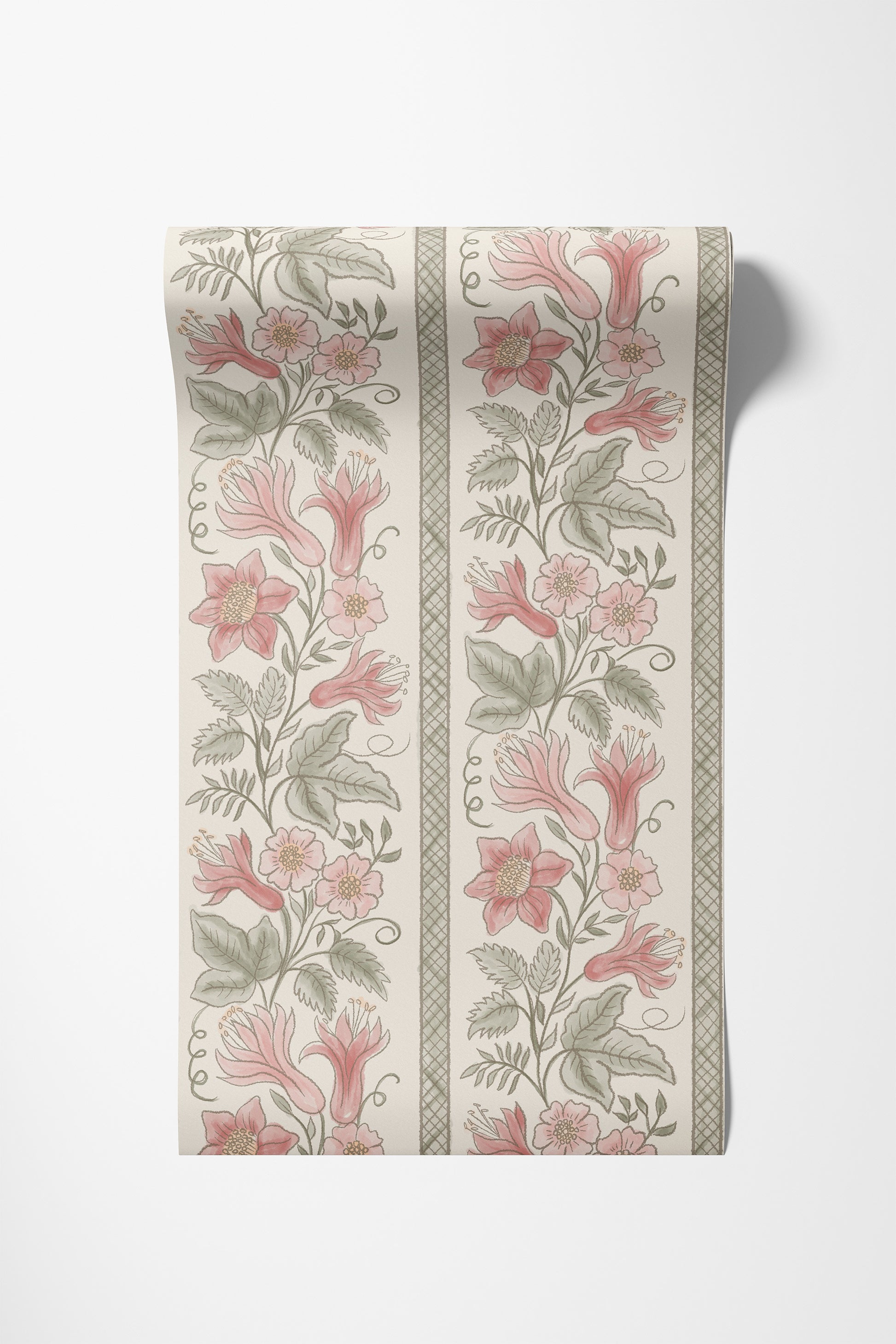 A roll of wallpaper with a girly vintage botanical pattern featuring pink flowers and green leaves on an off-white background, shown against a light gray wall.