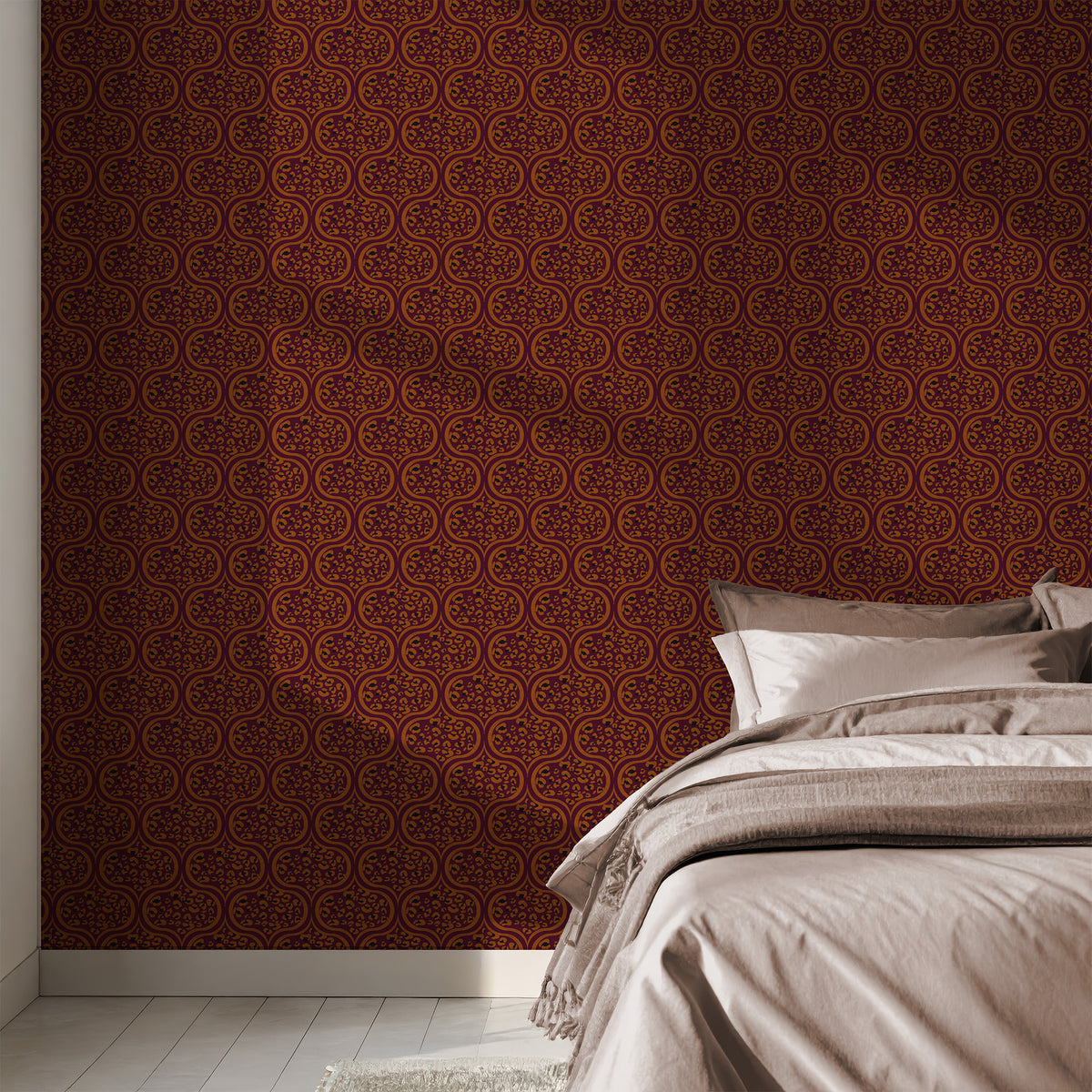 Terracotta leopard ogee wallpaper behind a bed with linen bedding