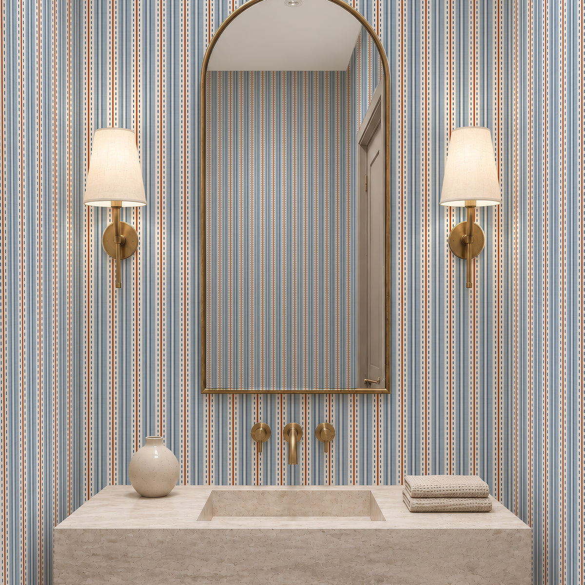 Ticking stripe wallpaper in a light powder room